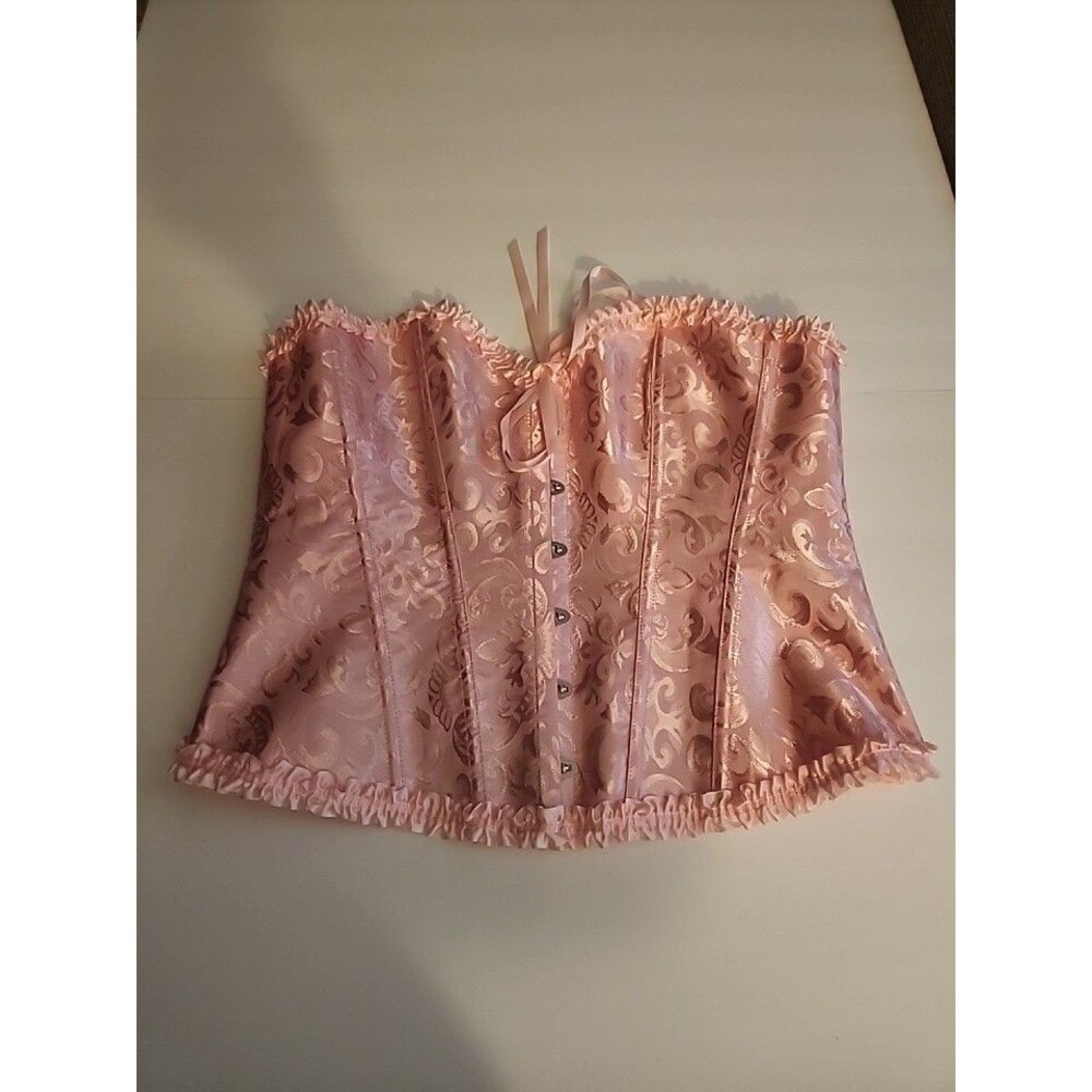 Woman's X Large Pink Corset and Thong set.